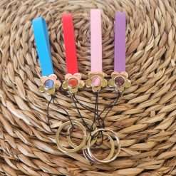 STOCK 10 PZ Portachiavi in Similpelle con Fiore - Bomboniere Compleanno, Comunione